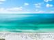 Beachfront property with ocean and beach umbrellas at 6326 Midnight Pass Rd # 101, Sarasota, FL 34242