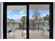 Relaxing balcony with seating and partial ocean view at 6326 Midnight Pass Rd # 101, Sarasota, FL 34242