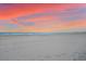 Peaceful beach view at sunset at 6326 Midnight Pass Rd # 101, Sarasota, FL 34242