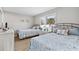Guest bedroom with two twin beds and coastal bedding at 6326 Midnight Pass Rd # 101, Sarasota, FL 34242