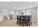 Casual dining area with a table and four chairs at 6326 Midnight Pass Rd # 101, Sarasota, FL 34242