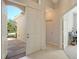 Bright and airy foyer with view of the backyard at 6422 42Nd E St, Sarasota, FL 34243