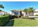 Well-maintained house with lush landscaping and a two-car garage at 6422 42Nd E St, Sarasota, FL 34243