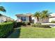 Well-maintained house with lush landscaping and a two-car garage at 6422 42Nd E St, Sarasota, FL 34243