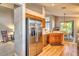 Stainless steel appliances and light wood cabinets feature in this kitchen at 6422 42Nd E St, Sarasota, FL 34243