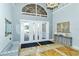 Elegant lobby with high ceilings and stylish decor at 6422 42Nd E St, Sarasota, FL 34243