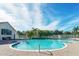 Large community pool with plenty of space for relaxing at 6422 42Nd E St, Sarasota, FL 34243