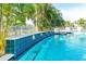 Stunning pool detail featuring lion head fountains and tilework at 6422 42Nd E St, Sarasota, FL 34243