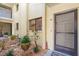 Inviting condo exterior with well-maintained landscaping and private entrance at 6703 Midnight Pass Rd # 108B, Sarasota, FL 34242