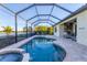 Enclosed pool and spa with outdoor kitchen at 7036 Whittlebury Trl, Bradenton, FL 34202