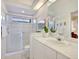 Clean bathroom boasts a large shower and updated vanity at 7207 Saint Johns Way, University Park, FL 34201