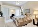 Spacious bedroom with a comfy bed, built-in desk and lots of closet space at 7207 Saint Johns Way, University Park, FL 34201