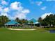 Country club with golf course and palm trees at 7207 Saint Johns Way, University Park, FL 34201