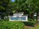 University Park Country Club entrance sign with lush landscaping at 7207 Saint Johns Way, University Park, FL 34201