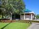 Tennis and fitness center with manicured landscaping at 7207 Saint Johns Way, University Park, FL 34201