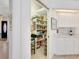 Well-stocked pantry with ample shelving at 7207 Saint Johns Way, University Park, FL 34201