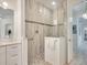 Walk-in shower with modern tile and glass enclosure at 7207 Saint Johns Way, University Park, FL 34201