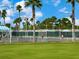 Tennis players enjoying a game on the courts at 7207 Saint Johns Way, University Park, FL 34201