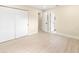 Light and airy bedroom with neutral walls and wood floors at 727 N Jefferson Ave # 727, Sarasota, FL 34237