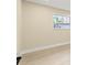 Well lit bedroom with window and neutral decor at 727 N Jefferson Ave # 727, Sarasota, FL 34237