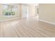 Bright living room with large window and access to exterior at 727 N Jefferson Ave # 727, Sarasota, FL 34237