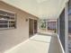Bright screened porch overlooking the backyard at 727 N Jefferson Ave # 727, Sarasota, FL 34237