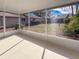 Spacious screened porch with view of backyard at 727 N Jefferson Ave # 727, Sarasota, FL 34237