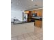 Kitchen with granite countertop and wood cabinets at 732 Tuxford Dr, Sarasota, FL 34232