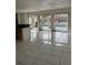 Kitchen with island and access to pool area at 732 Tuxford Dr, Sarasota, FL 34232