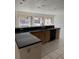 L-shaped kitchen with granite countertops at 732 Tuxford Dr, Sarasota, FL 34232