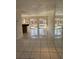 Living area with mirrored wall and pool view at 732 Tuxford Dr, Sarasota, FL 34232