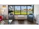 Waterfront living room with comfy seating and natural light at 758 Sarabay Rd # 5, Osprey, FL 34229