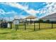 Fenced dog park with shaded seating at 7668 Registrar Way, Sarasota, FL 34243
