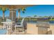 Outdoor grilling station with seating at 7668 Registrar Way, Sarasota, FL 34243