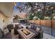 Relaxing backyard patio with fire pit and seating area at 8204 Constance Dr, Sarasota, FL 34243