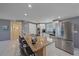 Modern kitchen with stainless steel appliances and granite countertops at 8204 Constance Dr, Sarasota, FL 34243
