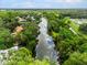 An aerial shot of a peaceful waterfront community at 869 Forestview Dr, Sarasota, FL 34232