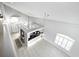 Open concept kitchen and living area with high ceilings at 8737 Pebble Creek Ln, Sarasota, FL 34238