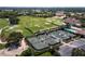 Aerial view of community tennis courts at 8737 Pebble Creek Ln, Sarasota, FL 34238