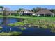 Luxury home with pool and lake view in upscale community at 9420 Old Hyde Park Pl, Lakewood Ranch, FL 34202