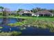 Luxury home with pool and lake view in upscale community at 9420 Old Hyde Park Pl, Lakewood Ranch, FL 34202