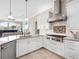 Updated kitchen with stainless steel appliances and granite countertops at 9420 Old Hyde Park Pl, Lakewood Ranch, FL 34202