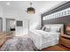 Main bedroom with access to bathroom and walk-in closet at 9420 Old Hyde Park Pl, Lakewood Ranch, FL 34202