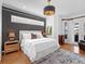 Spacious main bedroom with hardwood floors and lots of natural light at 9420 Old Hyde Park Pl, Lakewood Ranch, FL 34202