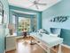 Bright office features a built-in window seat and wood floors at 9420 Old Hyde Park Pl, Lakewood Ranch, FL 34202
