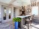 Modern outdoor kitchen with stainless steel appliances at 9420 Old Hyde Park Pl, Lakewood Ranch, FL 34202
