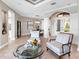 Relaxing sitting area near entryway and dining room at 9420 Old Hyde Park Pl, Lakewood Ranch, FL 34202