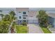 Two-story waterfront home with modern design and large yard at 970 Boca Ciega Isle Dr, St Pete Beach, FL 33706