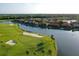 Aerial view of upscale homes, golf course, and waterway at 9818 Discovery Ter, Bradenton, FL 34212