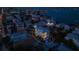 Night aerial view of house near the water with city lights at 105 6Th S St, Bradenton Beach, FL 34217
